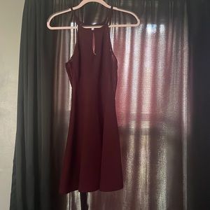 Teen dress size 9, maroon color with just right amount of open side.